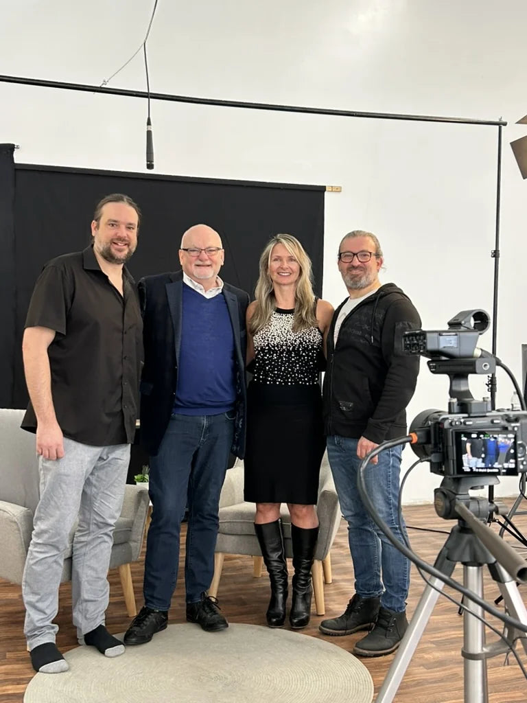 A group photo on the podcast set.
